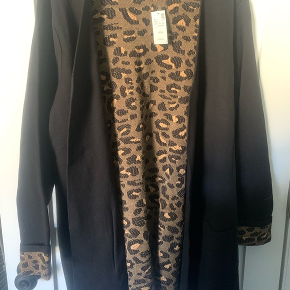 Lane Bryant Sweaters - Lane Bryant cardigan sweater
Never worn
Black with inside leopard print